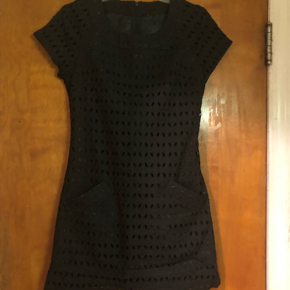 Black dress with cut-out pattern